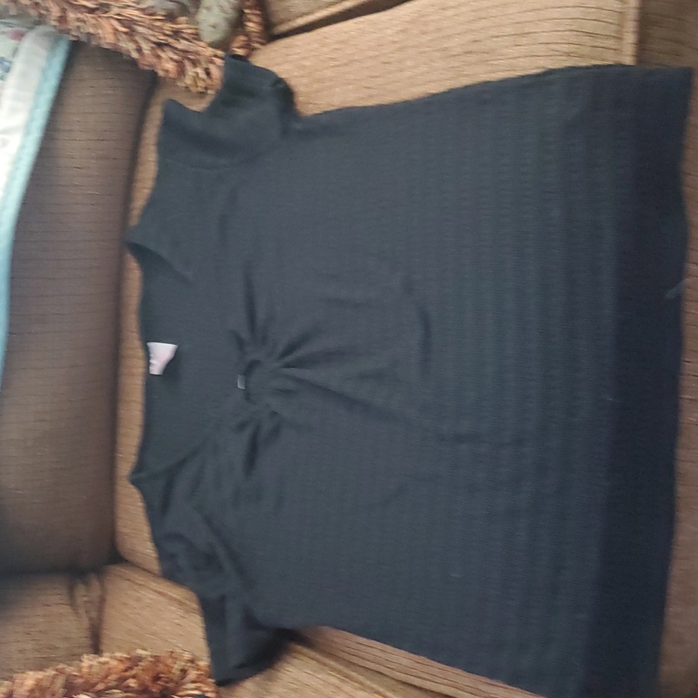 Large black with circle design in middle